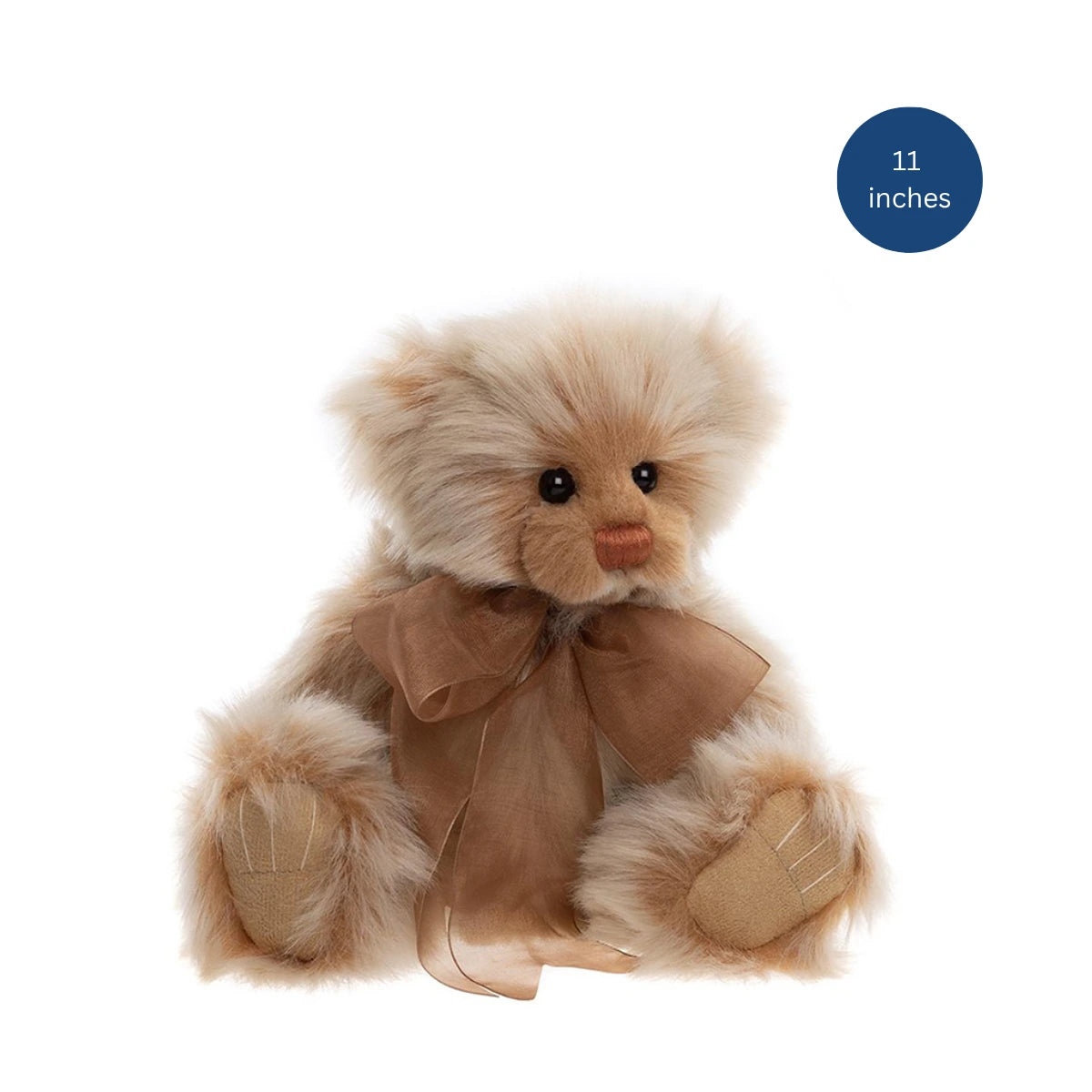 Stuffed teddy bear with a brown bow tie on a white background, labeled as 11 inches.