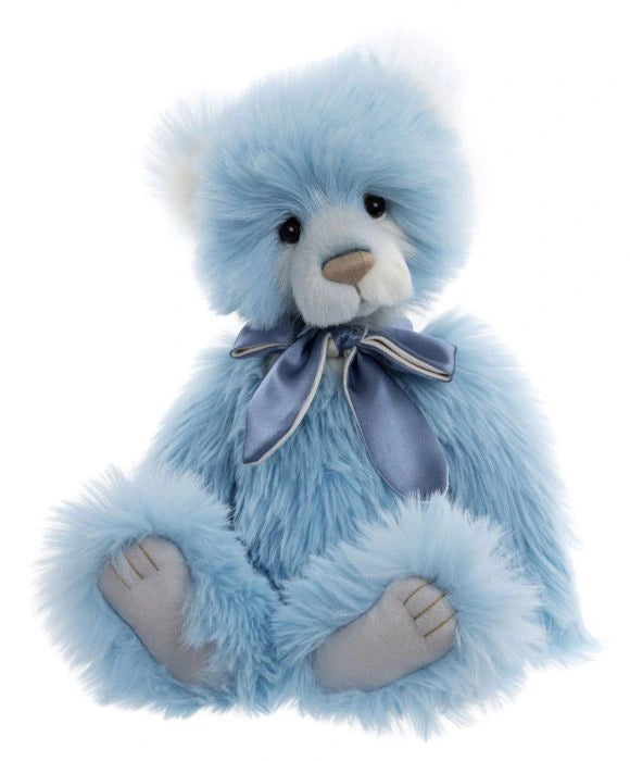 Blue teddy bear with a bow tie on a white background